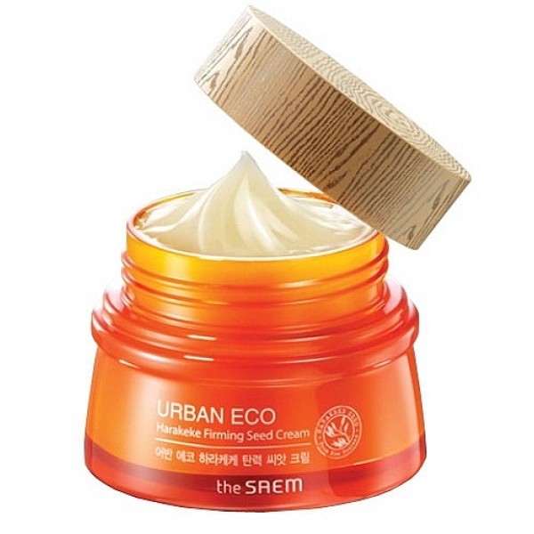 крем с экстрактом новозеландского льна the saem urban eco harakeke firming seed cream крем с экстрактом новозеландского льна the saem urban eco harakeke firming seed creamUrban Eco Harakeke Firming Seed Cream. Крем с экстрактом новозеландского льна.<br><br>Укрепляющий крем с экстрактом Harakeke предназначен для глубокого питания и восстановления кожи, он укрепляет и увлажняет кожу, ускоряет синтез коллагена и эластина, обеспечивает обновление на клеточном уровне. Кожа приобретает гладкость и упругость, разглаживаются морщинки, улучшается цвет лица. Новозеландский лён Harakeke оказывает смягчающее и успокаивающее действие на кожу. Кроме того, экстракт харакеке незаменим при лечении кожных воспалений, ранок, ожогов, так как он защищает ранки от попадания в них бактерий и ускоряет заживление.<br><br>Серия создана с максимальным количеством натуральных компонентов: кроме новозеландского льна в составе крема мёд, экстракты календулы, лаванды, бергамота, мяты перечной, фрезии, ромашки, розмарина. Также в составе крема аденозин и пантенол.<br><br>Экстракт мёда – питает и смягчает кожу, наполняет её витаминами и минералами, оказывает антибактериальное, противовоспалительное, антимикробное, противовирусное, антисептическое и антигрибковое действие. Мёд идеально ухаживает за любым типом кожи. Успокаивает чувствительную кожу, способствует оздоровлению жирной и проблемной кожи. Сухую и нормальную кожу мёд мануки увлажняет, тонизирует, делает её нежной, мягкой, бархатистой.<br><br>Экстракт календулы – оказывает выраженное противовоспалительное и ранозаживляющее, успокаивающее и очищающее действие, поэтому незаменим при уходе за жирной и проблемной кожей. Кроме того, календулу применяют для омоложения кожи, уменьшения пигментных пятен и веснушек. Календула возвращает коже утраченные упругость и эластичность.<br><br>Аденозин – эффективный омолаживающий компонент, способствует избавлению от морщин, регулирует окислительно-восстановительные процессы в клетках кожи, замедляя её старение, улучшает тонус кожи, делает её светлее.<br><br>Пантенол – омолаживает, укрепляет и увлажняет кожу, стимулирует синтез коллагена и эластина, обеспечивает клеточное восстановление. Кожа обновляется, становится более гладкой и упругой, разглаживаются морщинки, восстанавливается естественная эластичность.<br><br>Крем имеет приятную сливочную текстуру и легкий ненавязчивый аромат, хорошо впитывается в кожу, не оставляет жирной или липкой пленки. Подходит для любого типа кожи.<br><br>Применение: На очищенную кожу лица нанести крем легкими похлопывающими движениями.<br><br>Объем: 60;80 мл<br>