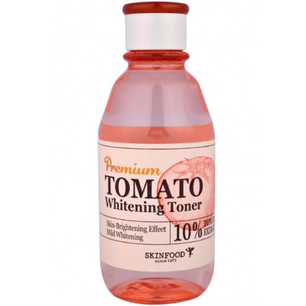 тонер осветляющий с экстрактом томата skin food premium tomato whitening toner тонер осветляющий с экстрактом томата skin food premium tomato whitening tonerPremium Tomato Whitening Toner. Тонер осветляющий с экстрактом томата<br><br>Осветляющий тонер, который обеспечит коже деликатный и полноценный уход, а также очищение и увлажнение. Тонер рекомендуется применять сразу после умывания, чтобы избежать появления сухости и шелушений. Тонер мягко убирает мертвые клетки, ускоряет обновление кожи, отлично выравнивает ее тон.<br><br>Средство содержит такие натуральные ингредиенты, как:<br><br>Экстракт томата – лечит угревые высыпания, нормализует работу сальных желез, выводит вредные вещества и обновляет клетки. Томат деликатно осветляет пигментацию, делает тон идеально ровным, а кожу подтянутой.<br><br>Экстракт лотоса – снимает раздражения, укрепляет клетки, устраняет воспаления, улучшает кровоснабжение, предупреждает раннее старение кожи.<br><br>Керамиды – оберегают кожу и возвращают утраченную упругость.<br><br>Экстракт софоры – обновляет кожу, сохраняет ее эластичность и обеспечивает антиоксидантный эффект.<br><br>Тонер очищает кожу и готовит ее к дальнейшему уходу, обеспечивает лучшее усвоение активных веществ. При постоянном применении средства кожа становится идеально гладкой, чистой, мягкой и сияющей.<br><br>Способ применения: Смочить тонером ватный диск и протереть лицо мягкими движениями.<br><br>Объем: 180 мл<br>