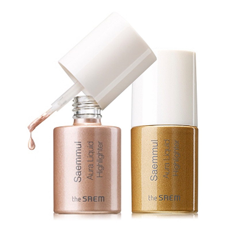 хайлайтер сияющий жидкий the saem saemmul aura liquid highlighter хайлайтер сияющий жидкий the saem saemmul aura liquid highlighterSaemmul Aura Liquid Highlighter. Хайлайтер сияющий жидкий<br><br>Великолепный 3D-макияж, абсолютная естественность и скульптурность кожи, утонченность и изысканность. Легкий хайлайтер с невесомой гелевой текстурой позволяет подчеркнуть отдельные зоны лица (скулы, надбровные дуги и т.д.), а также придать коже легкое жемчужное мерцание – лицо будет выглядеть свежо и моложе. <br><br>В составе средства высокое содержание натуральных экстрактов (тысячелистника, арники, полыни, камелии, магнолии, лотоса, сливы, персика, моринги, шелковицы, пиона, ромашки, лилия), которые увлажняют и освежают кожу, снимают воспаления и устраняют покраснения, осветляют кожу и наполняют ее жизненной силой, обеспечивают антиоксидантную защиту. <br><br>Аргановое масло – увлажняет и питает кожу, возвращает ей жизненную силу и ухоженность. <br><br>Незаменимые жирные кислоты борются с обезвоживанием кожи, восстанавливают и омолаживают увядающую и усталую кожу лица, возвращают ей эластичность и упругость, разглаживают неглубокие морщинки, помогают замедлить процессы старения. <br><br>Мощные антиоксидантные свойства масла защищают кожу от воздействия свободных радикалов и негативного влияния УФ-лучей. Хайлайтер прекрасно распределяется по коже лица и мгновенно впитывается, делает кожу жемчужно-сияющей снаружи и увлажненной изнутри. <br><br>Стойкая формула позволяет держаться макияжу в течение долгих часов. Также хайлайтер можно смешать с любимым ББ-кремом или базой под макияж (1: 2 или 1: 3). <br><br>Средство представлено 2 оттенками: <br><br><br>01 Pink Light <br><br>02 Gold Light <br><br><br>Способ применения: Нанести халайтер на области лица, которые требуют акцентирования.<br><br>Вес: 8 г<br><br>Вес г: 8.00000000