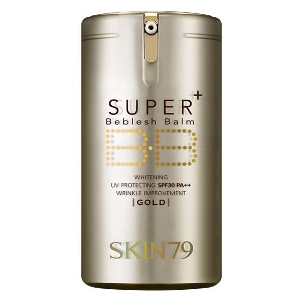 многофункциональный бб крем тройного действия skin79 super beblesh balm spf30 pa++ (gold) многофункциональный бб крем тройного действия skin79 super beblesh balm spf30 pa++ (gold)Super Beblesh Balm Spf30 Pa++ (Gold). Многофункциональный ББ крем тройного действия<br><br>Многофункциональный BB-крем премиум-класса не просто маскирует недостатки кожи, но также борется с признаками старения, излишней пигментацией кожи, эффективно защищает от солнечных лучей.<br><br><br>Аденозин и арбутин, входящие в состав крема, осветляют кожу и разглаживают морщины.<br><br>Аденозин значительно повышает упругость и эластичность кожи.<br><br>Арбутин является интенсивно осветляющим средством, устраняет веснушки, пигментные пятна и темные круги под глазами, следы пост-акне.<br><br>Натуральные экстракты, входящие в состав крема, интенсивно питают, увлажняют и освежают кожный покров, а также регулируют работу сальных желез.<br><br><br>Благодаря глубокой увлажненности, кожа перестает усиленно вырабатывать кожный жир. Благодаря этому фактору, кожа становится матовой, предотвращается забивание пор. Такие компоненты как золото, экстракт икры интенсивно питают кожу, дарят ей сияние и ухоженный вид. ВВ-крем дает естественное покрытие без эффекта маски и подходит для сухой, нормальной и склонной к пигментации кожи.<br><br>Способ применения: нанесите крем точечно, равномерно растушуйте по всей поверхности кожи.<br><br>Объем: 40 мл<br>