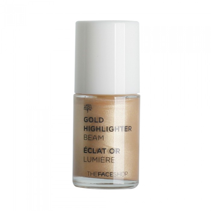 хайлайтер золотой the face shop tfs. gold highlighter beam хайлайтер золотой the face shop tfs. gold highlighter beamTFS. Gold Highlighter Beam. Хайлайтер золотой<br><br>Жидкий хайлайтер обладает нежной, полупрозрачной текстурой и легко распределяется по коже, придавая лицу форму и сияние. Средство предназначено для того, чтобы выделить и «подсветить» отдельные участки лица, создавая 3-d эффект.<br><br>Хайлайтер выгодно подчеркивает достоинства лица, придает коже деликатное сияние, увлажняет и питает ее благодаря натуральным компонентам. Средство имеет шелковистую, не липкую текстуру, идеально ложится на кожу, скрывая мелкие недостатки – темные круги, следы усталости, недосыпа. Хайлайтер придает коже здоровый цвет, адаптируется к любому цвету и типу кожи. Средство не вызывает раздражений, поэтому может быть использовано на чувствительной коже.<br><br>Способ применения: Нанесите хайлайтер на нужные участки лица (спинка носа, лоб, щеки, веки, вокруг глаз и т.д.) при помощи аппликатора, растушуйте кончиком пальца или спонжем. Можно использовать жидкую базу в соотношении 1:2 с ВВ-кремом; в сочетании с консилером для зоны вокруг глаз; в сочетании с тенями для макияжа скул.<br><br>Объём: 14 мл<br>
